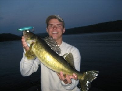 My girl's first walleye on a topwater lure ! : r/Fishing